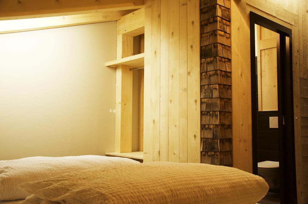 Huettenhotel Husky Lodge Муотаталь Номер фото